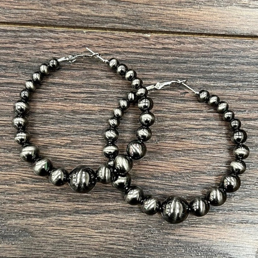 Graduated Polished Silver Navajo Pearl Hoop Earrings