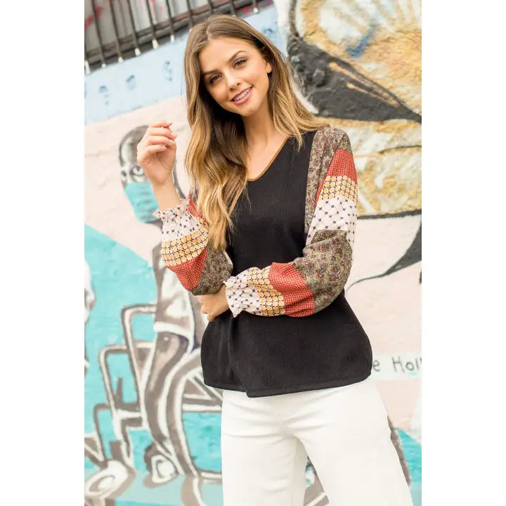 Women's L/S Multi Print Blocked Sleeve Knit Top in Black