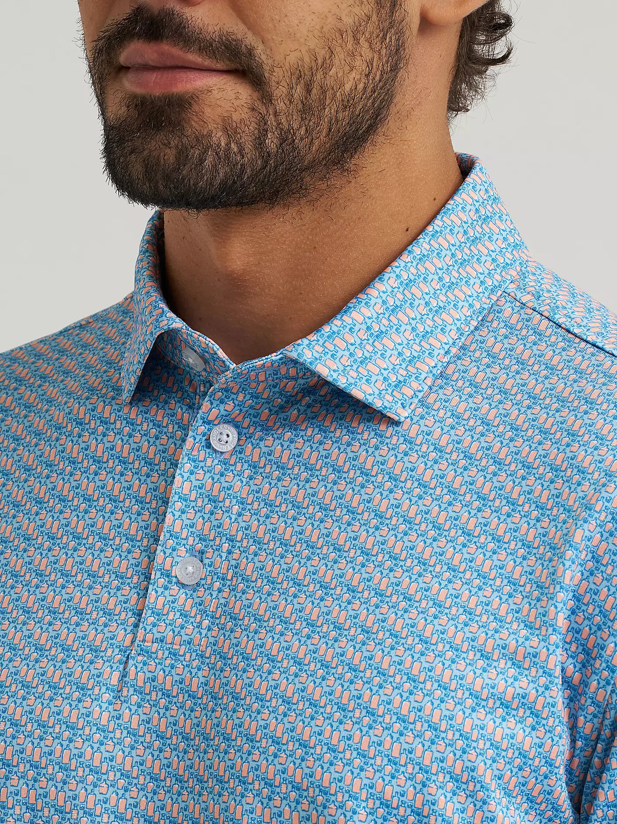 Wrangler ATG Men's Performance Polo Shirt in Papaya Punch