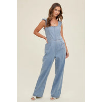 Women's Ruffle Open Back Denim Jumpsuit in Light Wash