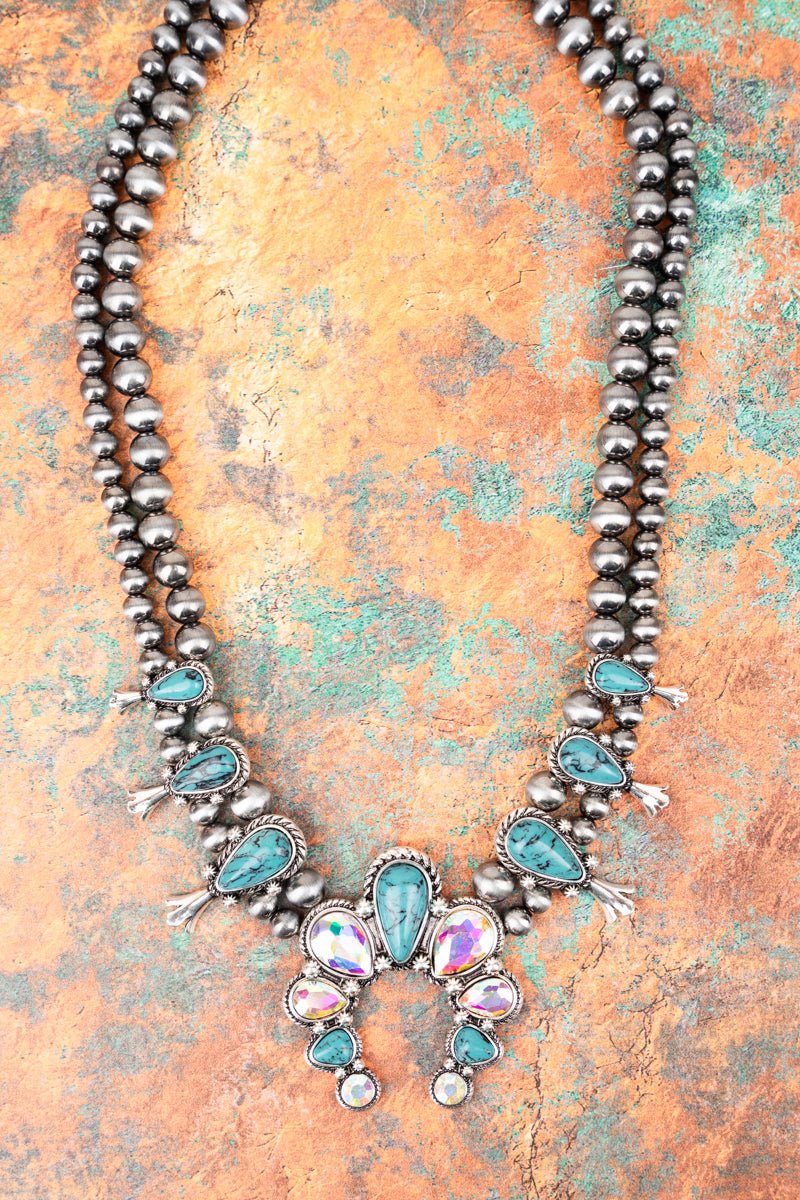 Western Newcastle Turquoise and Iridescent Crystal Squash Blossom Naja Burnished Silver Tone Necklace